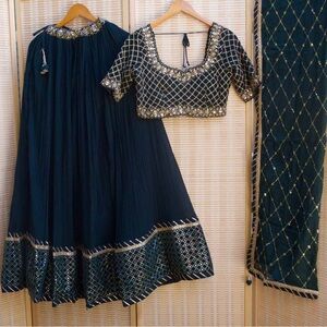 Elegant Dark Green Embellished Lehenga Set